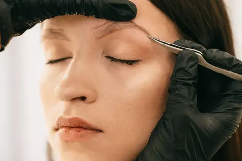 Plucking eyebrows